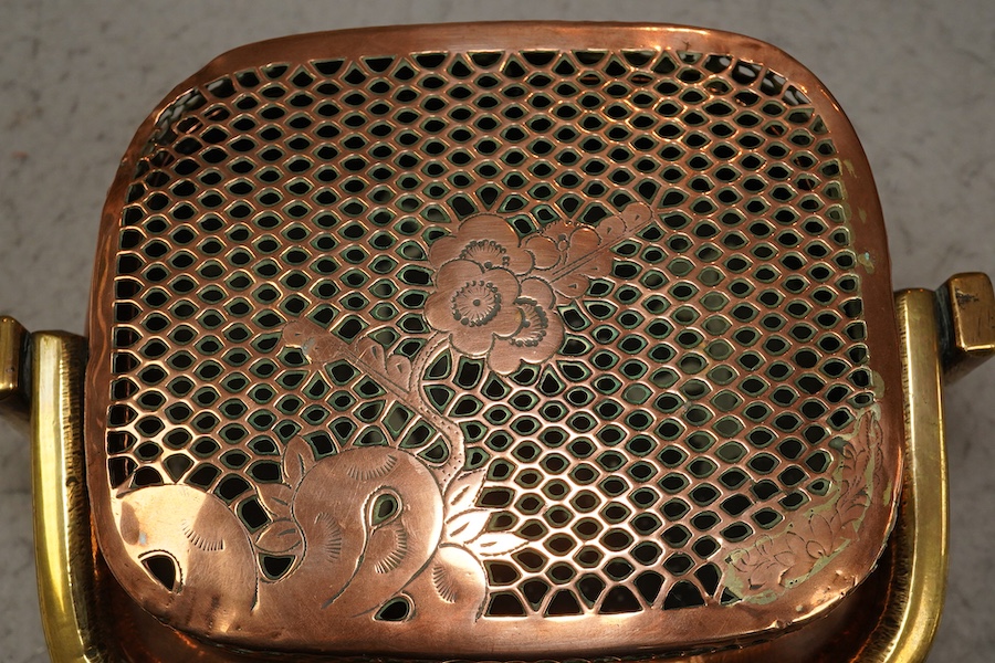 A Chinese copper alloy hand warmer, 18th century